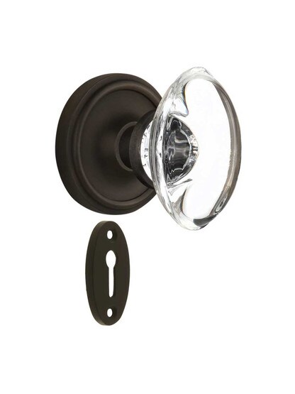 Classic Rosette Mortise-Lock Set with Oval Crystal Glass Knobs in Oil-Rubbed Bronze.